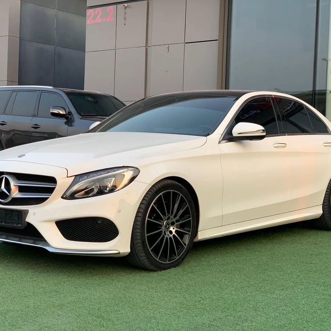Used Mercedes-Benz C-Class 200 IV (W205), 2.0 l, 2018 in Abu Dhabi by Al Fajr Automobile showroom, White color. GCC Specs | AUTO.AE