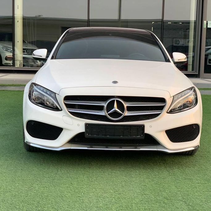 Used Mercedes-Benz C-Class 200 IV (W205), 2.0 l, 2018 in Abu Dhabi by Al Fajr Automobile showroom, White color. GCC Specs | AUTO.AE