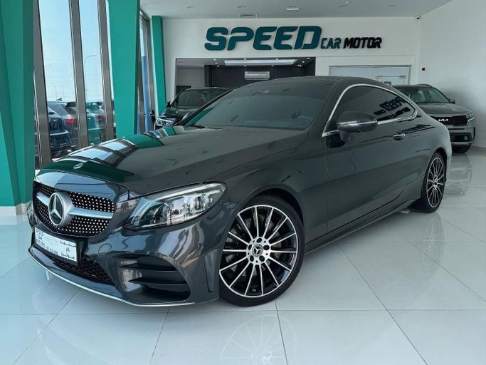 Used Mercedes-Benz C-Class 300 IV (W205) Facelift, 2.0 l, 2019 in Abu Dhabi by Speed Car Motors, Black color.  | AUTO.AE