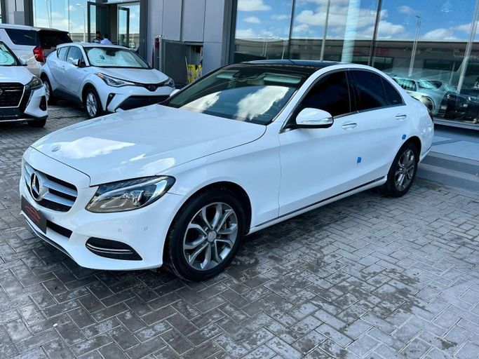 Used Mercedes-Benz C-Class 200 IV (W205), 2.0 l, 2015 in Abu Dhabi by Speed Car Motors, White color.  | AUTO.AE