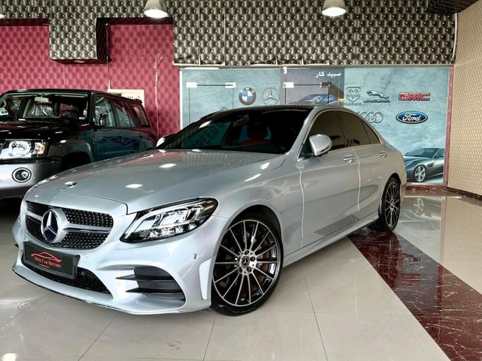 Used Mercedes-Benz C-Class 200 IV (W205) Facelift, 1.5 l, 2019 in Abu Dhabi by Speed Car Motors, Silver color.  | AUTO.AE