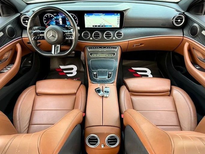 Used Mercedes-Benz E-Class 300 V (W213, S213, C238) Facelift, 2.0 l, 2022 in Abu Dhabi by Al Bayan Motors, White color. GCC Specs | AUTO.AE