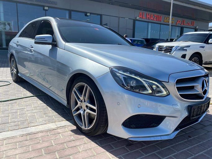 Used Mercedes-Benz E-Class 300 IV (W212, S212, C207) Facelift, 3.5 l, 2015 in Abu Dhabi by Golden coast automobile showroom, Silver color. GCC Specs | AUTO.AE