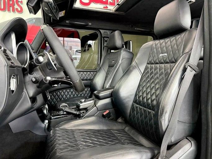 Подержанный Mercedes-Benz G-Class AMG 63 AMG I (W463) Рестайлинг 2, 5.5 л, 2015 в Абу-Даби от Edition One Motors Серый цвет. GCC | AUTO.AE