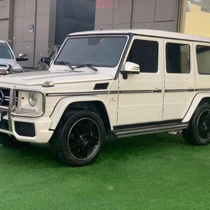Подержанный Mercedes-Benz G-Class AMG 63 AMG I (W463) Рестайлинг 2, 5.5 л, 2015 в Абу-Даби от Al Fajr Automobile showroom Белый цвет. GCC | AUTO.AE