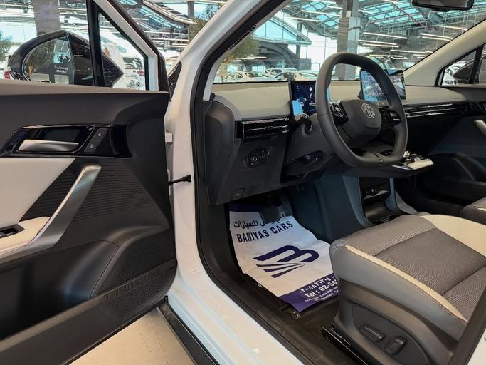 New MG 4 EV, 2025 in Abu Dhabi by Baniyas Cars Abu Dhabi, White color. GCC Specs | AUTO.AE