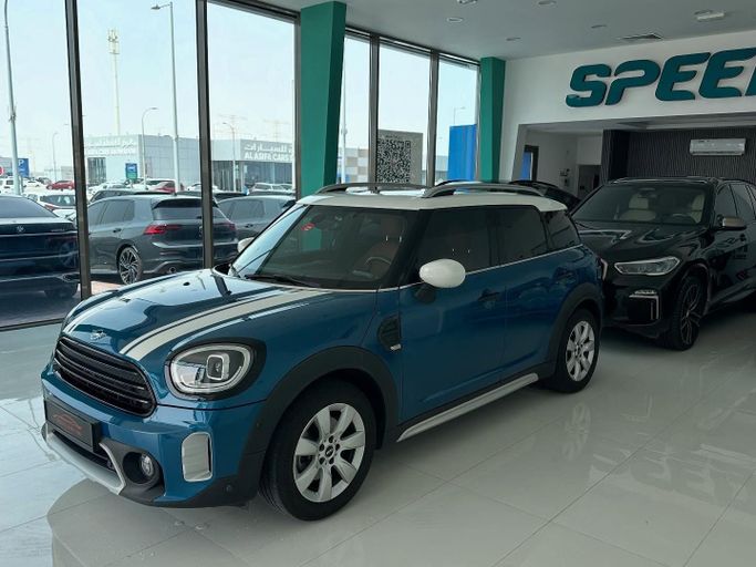 Подержанный MINI Countryman Cooper II Рестайлинг, 1.5 л, 2021 в Абу-Даби от Speed Car Motors Синий цвет.  | AUTO.AE