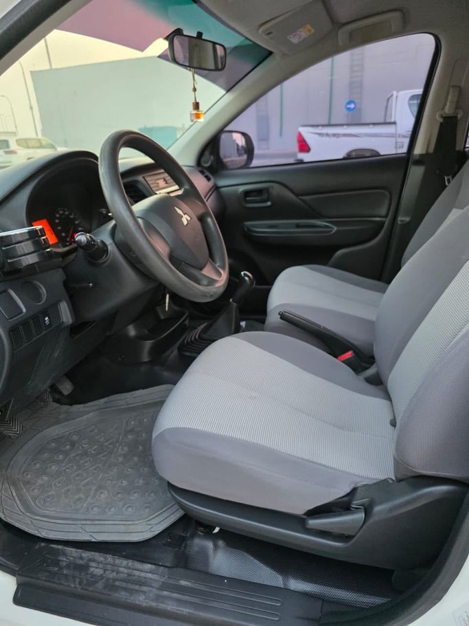 Подержанный Mitsubishi L200 V Рестайлинг, 2.4 л, 2020 в Абу-Даби от Diamond Waves Motors Белый цвет. Other | AUTO.AE