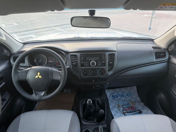 Used Mitsubishi L200 V Facelift, 2.4 l, 2020 in Abu Dhabi by Al Laith Cars Showroom, White color. GCC Specs | AUTO.AE