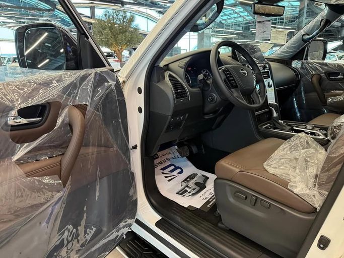 Новый Nissan Armada II Рестайлинг, 5.6 л, 2024 в Абу-Даби от Baniyas Cars Abu Dhabi Белый цвет. GCC | AUTO.AE