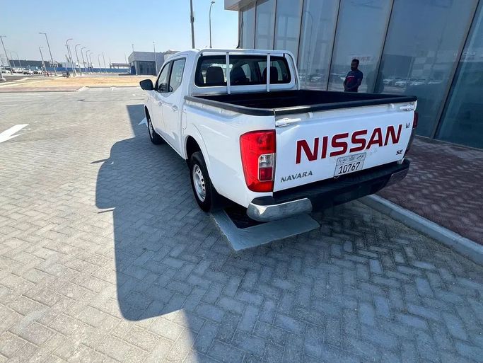 Used Nissan Navara (Frontier) IV (D23), 2.5 l, 2020 in Abu Dhabi by Al Asad Automobile Showroom, White color. GCC Specs | AUTO.AE
