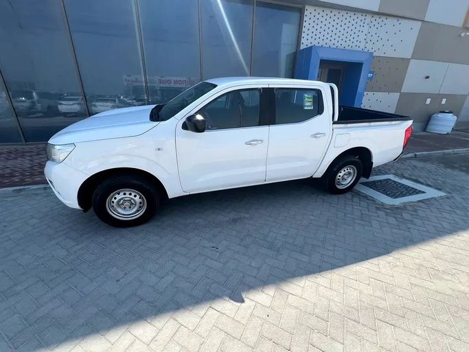 Used Nissan Navara (Frontier) IV (D23), 2.5 l, 2020 in Abu Dhabi by Al Asad Automobile Showroom, White color. GCC Specs | AUTO.AE