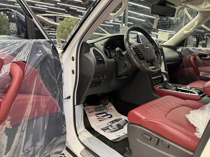 Новый Nissan Patrol VI (Y62) Рестайлинг 2, 5.6 л, 2024 в Абу-Даби от Baniyas Cars Abu Dhabi Белый цвет. GCC | AUTO.AE