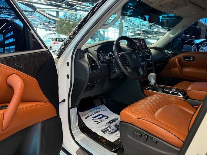 Подержанный Nissan Patrol VI (Y62) Рестайлинг 2, 5.6 л, 2023 в Абу-Даби от Baniyas Cars Abu Dhabi Белый цвет. GCC | AUTO.AE