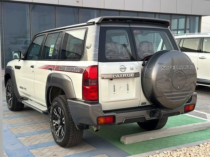 New Nissan Patrol V (Y61) Facelift, 4.8 l, 2024 in Abu Dhabi by Al Lulu Cars, White color. GCC Specs | AUTO.AE