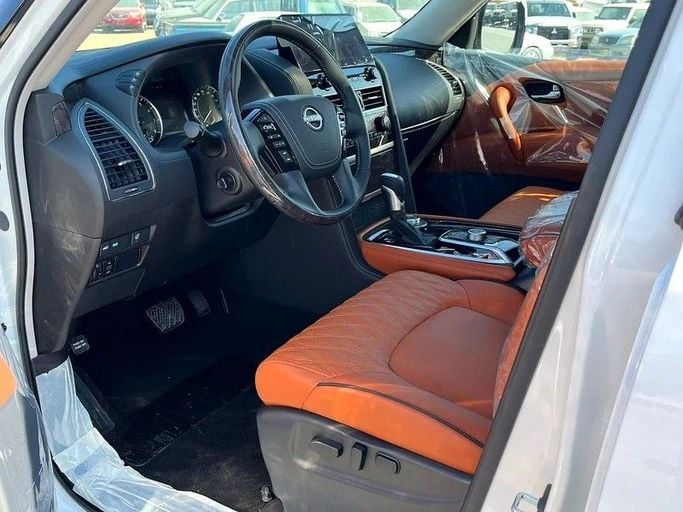 New Nissan Patrol VII (Y63), 3.8 l, 2024 in Abu Dhabi by Al Lulu Cars, White color. GCC Specs | AUTO.AE