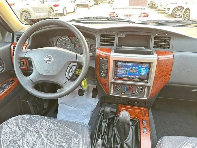 New Nissan Patrol V (Y61) Facelift, 4.8 l, 2024 in Abu Dhabi by Al Lulu Cars, Silver color. GCC Specs | AUTO.AE