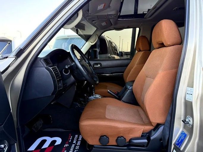 Used Nissan Patrol V (Y61) Facelift, 4.8 l, 2021 in Abu Dhabi by Al Bayan Motors, Golden color. GCC Specs | AUTO.AE