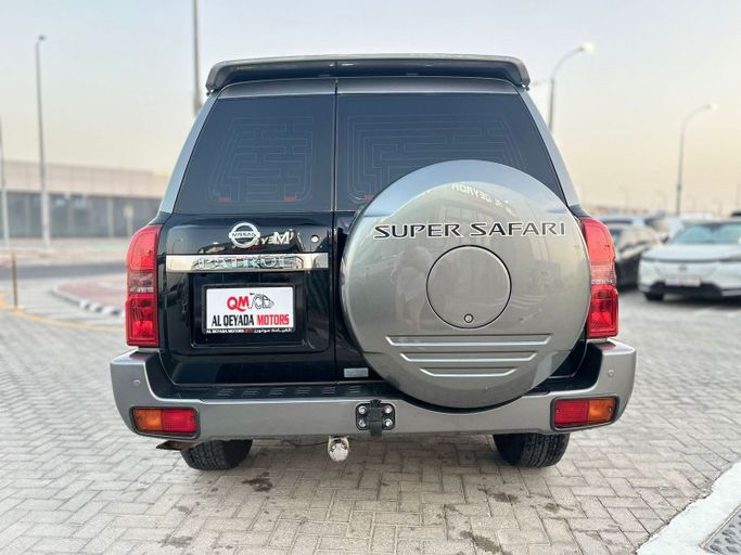 Used Nissan Patrol V (Y61) Facelift, 4.8 l, 2023 in Abu Dhabi by Al Qeyada Motors, Black color. GCC Specs | AUTO.AE