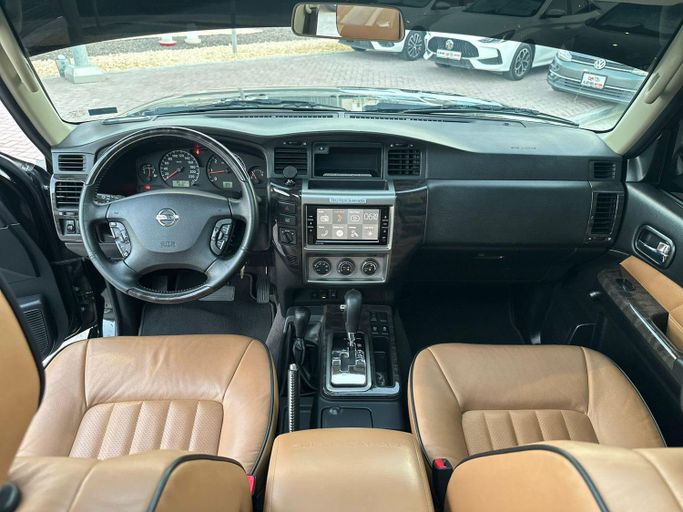 Used Nissan Patrol V (Y61) Facelift, 4.8 l, 2023 in Abu Dhabi by Al Qeyada Motors, Black color. GCC Specs | AUTO.AE