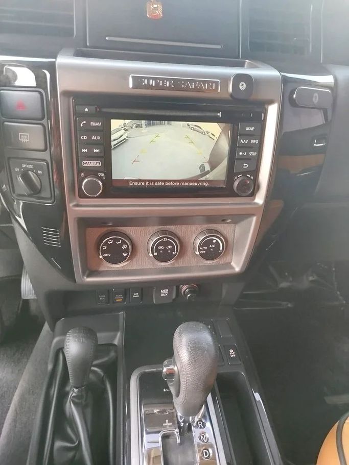 Used Nissan Patrol V (Y61) Facelift, 4.8 l, 2018 in Abu Dhabi by Al Asad Automobile Showroom, Golden color. GCC Specs | AUTO.AE