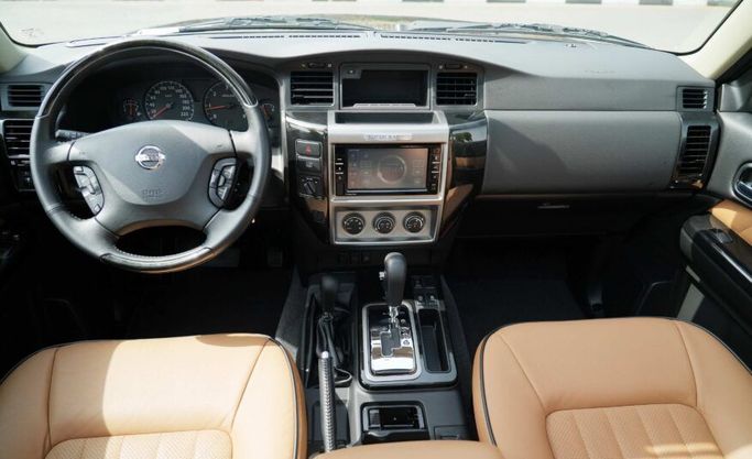 Used Nissan Patrol V (Y61) Facelift, 4.8 l, 2022 in Abu Dhabi by Advantage Motors, Golden color. GCC Specs | AUTO.AE