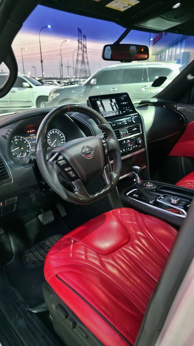 Подержанный Nissan Patrol VI (Y62) Рестайлинг, 5.6 л, 2016 в Абу-Даби Белый цвет. GCC | AUTO.AE