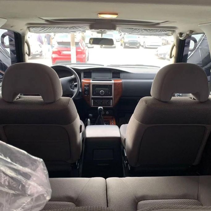 Used Nissan Patrol V (Y61) Facelift, 4.8 l, 2021 in Abu Dhabi by Al Fajr Automobile showroom, White color. GCC Specs | AUTO.AE