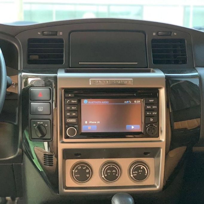 Подержанный Nissan Patrol V (Y61) Рестайлинг, 4.8 л, 2018 в Абу-Даби от Al Fajr Automobile showroom Белый цвет. GCC | AUTO.AE