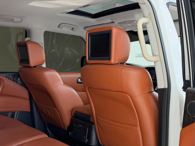 Подержанный Nissan Patrol VI (Y62) Рестайлинг 2, 5.6 л, 2021 в Абу-Даби от Speed Car Motors Белый цвет.  | AUTO.AE