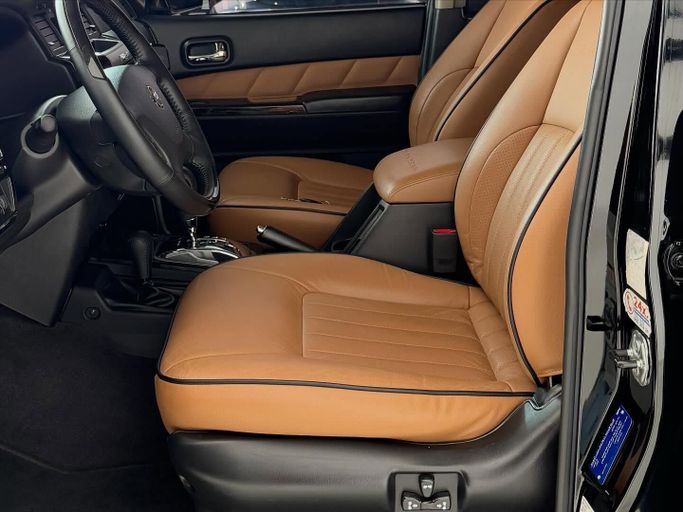 Подержанный Nissan Patrol V (Y61) Рестайлинг, 4.8 л, 2022 в Абу-Даби от Speed Car Motors Черный цвет.  | AUTO.AE