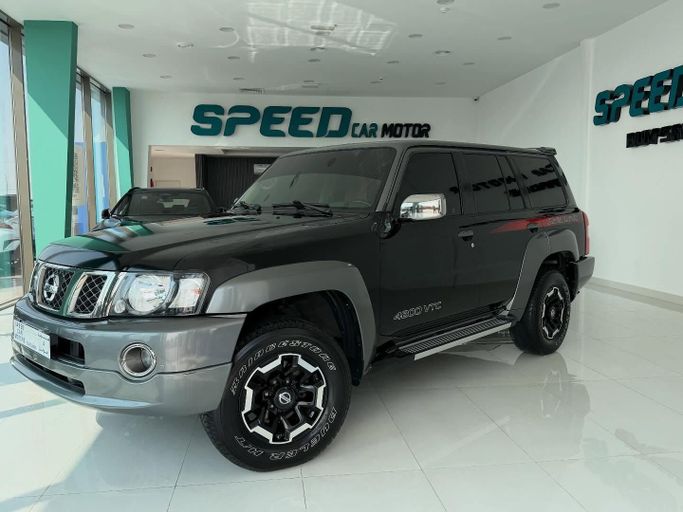 Подержанный Nissan Patrol V (Y61) Рестайлинг, 4.8 л, 2022 в Абу-Даби от Speed Car Motors Черный цвет.  | AUTO.AE