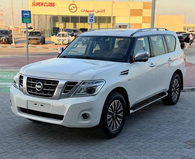 Подержанный Nissan Patrol VI (Y62) Рестайлинг 2, 5.6 л, 2019 в Абу-Даби от Al Laith Cars Showroom Белый цвет. GCC | AUTO.AE
