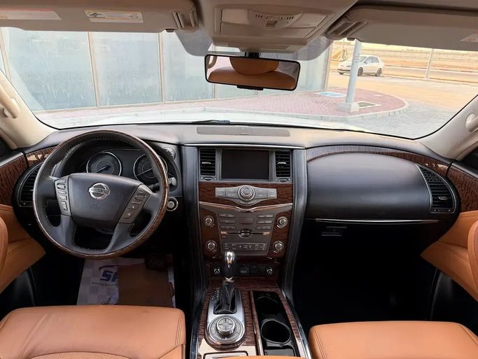 Подержанный Nissan Patrol VI (Y62) Рестайлинг 2, 5.6 л, 2019 в Абу-Даби от Al Laith Cars Showroom Белый цвет. GCC | AUTO.AE