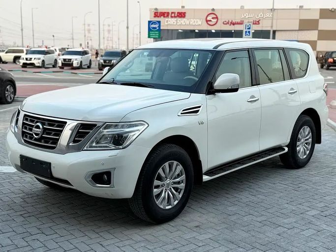 Подержанный Nissan Patrol VI (Y62) Рестайлинг 2, 5.6 л, 2019 в Абу-Даби от Al Laith Cars Showroom Белый цвет. GCC | AUTO.AE