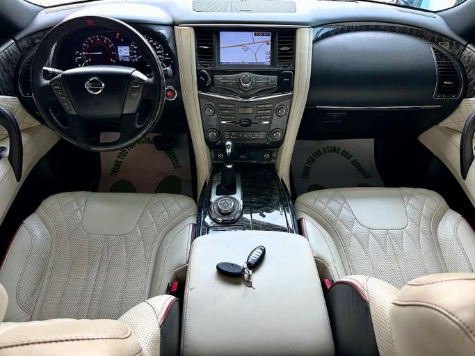 Подержанный Nissan Patrol VI (Y62) Рестайлинг, 5.6 л, 2015 в Абу-Даби от Speed Car Motors Черный цвет. GCC | AUTO.AE