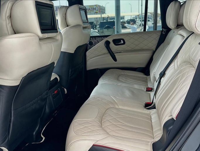 Подержанный Nissan Patrol VI (Y62) Рестайлинг, 5.6 л, 2015 в Абу-Даби от Speed Car Motors Черный цвет. GCC | AUTO.AE