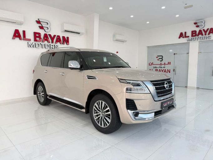 Подержанный Nissan Patrol VI (Y62) Рестайлинг 2, 5.6 л, 2021 в Абу-Даби от Al Bayan Motors Золотистый цвет. GCC | AUTO.AE