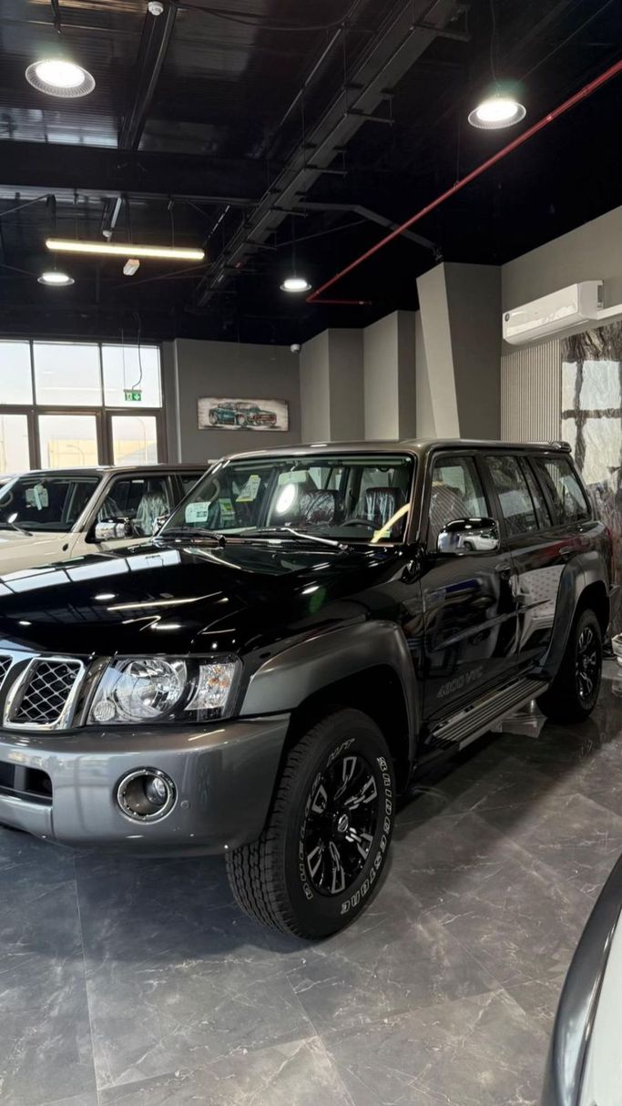 New Nissan Patrol V (Y61) Facelift, 4.8 l, 2024 in Abu Dhabi by Around The World Auto Mobile, Black color. GCC Specs | AUTO.AE