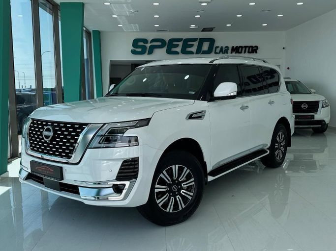 Подержанный Nissan Patrol VI (Y62) Рестайлинг 2, 4.0 л, 2024 в Абу-Даби от Speed Car Motors Белый цвет.  | AUTO.AE