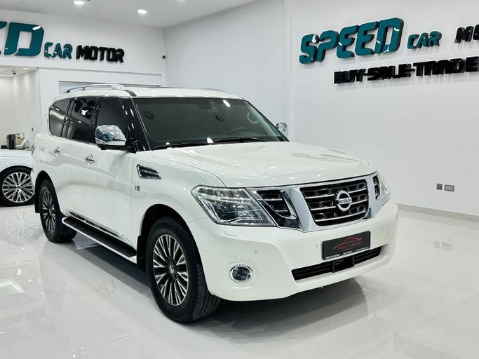 Подержанный Nissan Patrol VI (Y62) Рестайлинг, 5.6 л, 2014 в Абу-Даби от Speed Car Motors Белый цвет.  | AUTO.AE