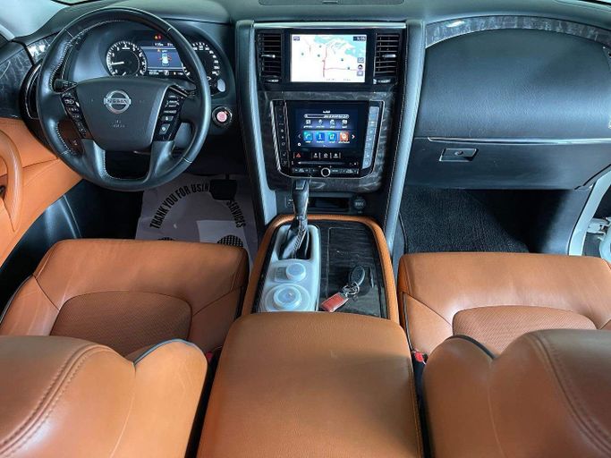Подержанный Nissan Patrol VI (Y62) Рестайлинг 2, 4.0 л, 2020 в Абу-Даби от Speed Car Motors Белый цвет.  | AUTO.AE