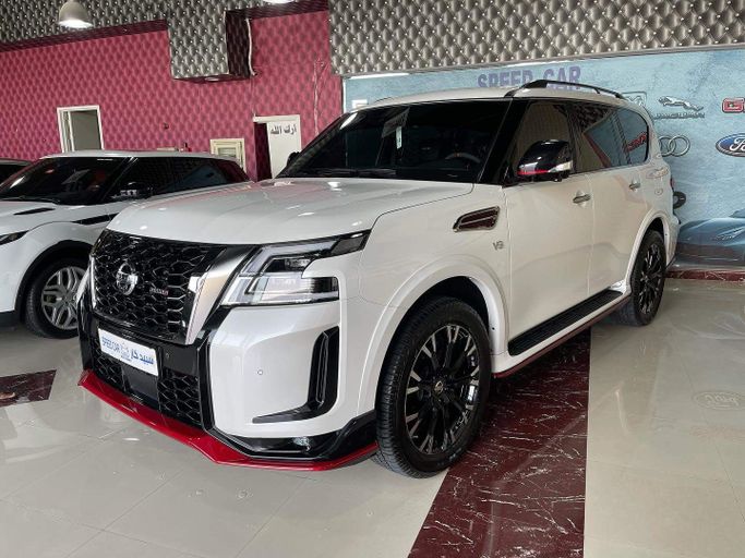 Подержанный Nissan Patrol VI (Y62) Рестайлинг 2, 5.6 л, 2021 в Абу-Даби от Speed Car Motors Белый цвет. GCC | AUTO.AE