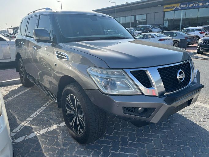 Подержанный Nissan Patrol VI (Y62), 5.6 л, 2012 в Абу-Даби от Golden coast automobile showroom Серый цвет. GCC | AUTO.AE