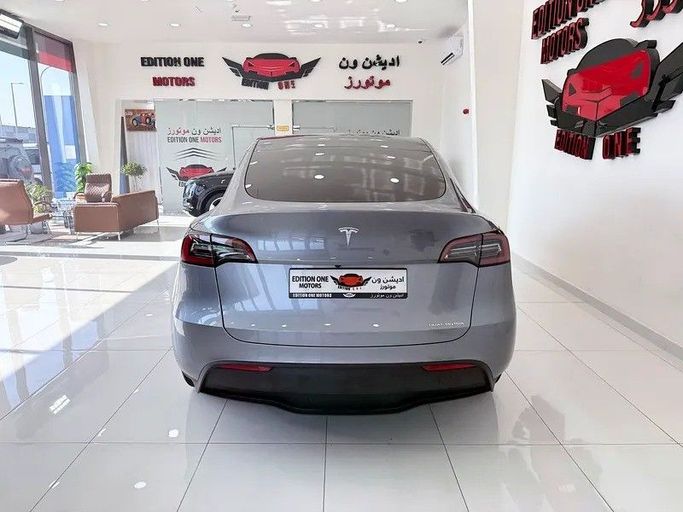 Used Tesla Model Y Long Range I, 2024 in Abu Dhabi by Edition One Motors, Grey color. GCC Specs | AUTO.AE