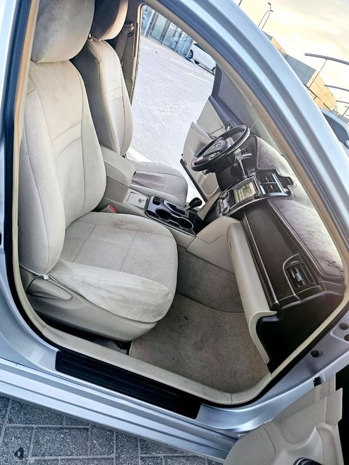 Used Toyota Camry VII (XV50) Facelift, 2.0 l, 2015 in Abu Dhabi by Al Asad Automobile Showroom, Silver color. GCC Specs | AUTO.AE