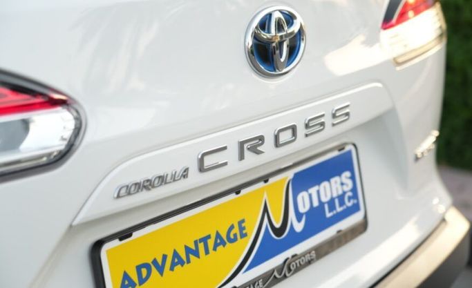 Used Toyota Corolla Cross I, 1.8 l, 2022 in Abu Dhabi by Advantage Motors, White color. GCC Specs | AUTO.AE