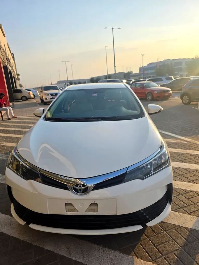 Used Toyota Corolla XII (E210), 1.6 l, 2018 in Abu Dhabi by Smart Motors Car Trading, White color. GCC Specs | AUTO.AE