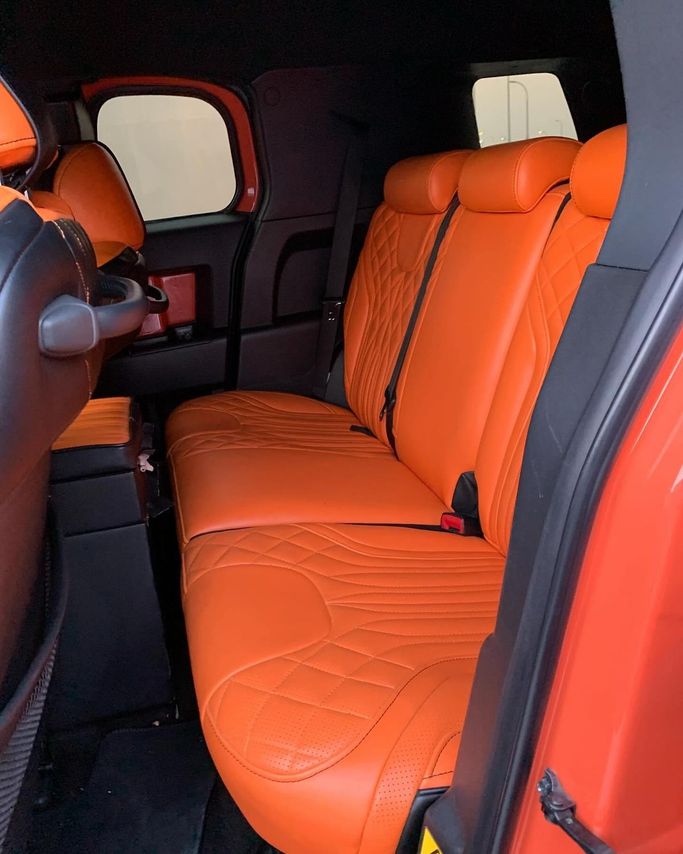 Подержанный Toyota FJ Cruiser, 4.0 л, 2014 в Абу-Даби от Al Fajr Automobile showroom Оранжевый цвет. Other | AUTO.AE