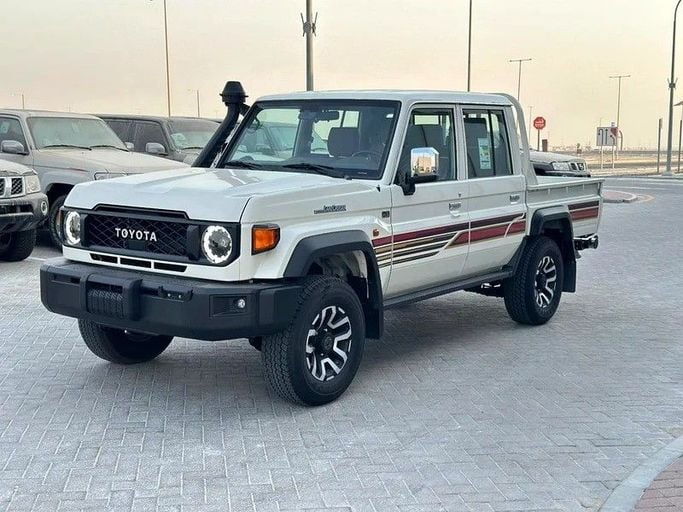 New Toyota Land Cruiser 70 Series Facelift 2, 4.0 l, 2025 in Abu Dhabi by Al Lulu Cars, White color. GCC Specs | AUTO.AE